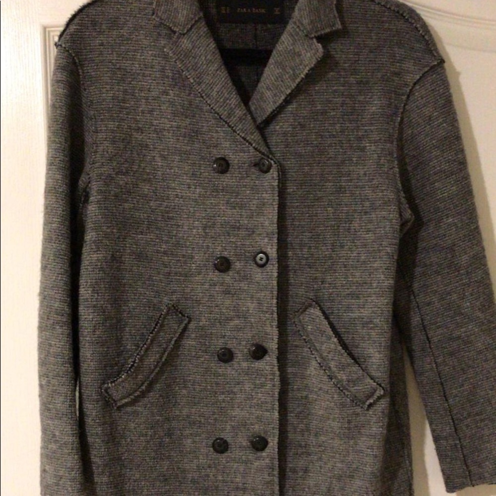Mid length grey double breasted coat